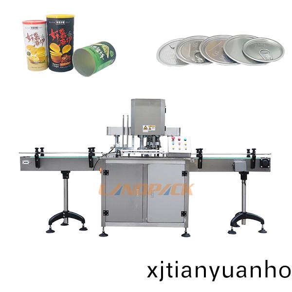 紙(zhi)鑵(guan)頭(tou)封(feng)鑵(guan)機(jī)(ji)