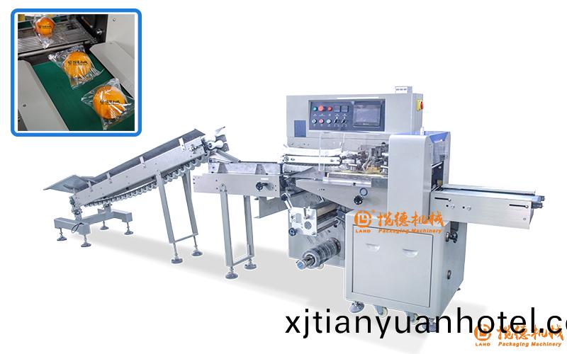 自(zi)動(dong)臍(qi)橙(cheng)包(bao)裝機