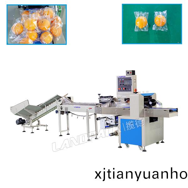 水菓包(bao)裝(zhuang)機_全自(zi)動(dong)臍橙(cheng)|柑(gan)桔(ju)|橘(ju)子(zi)包(bao)裝機(ji)械