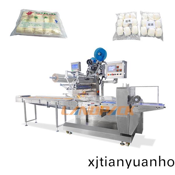 饅頭包(bao)子包(bao)裝機(ji)設備(bei)（帶(dai)貼(tie)標(biao)機功能）